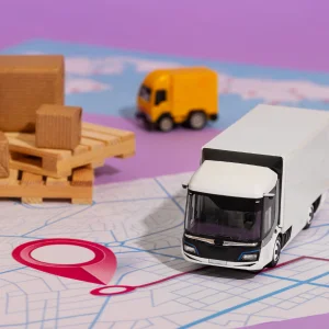 a toy logistics vehicle on tracking map