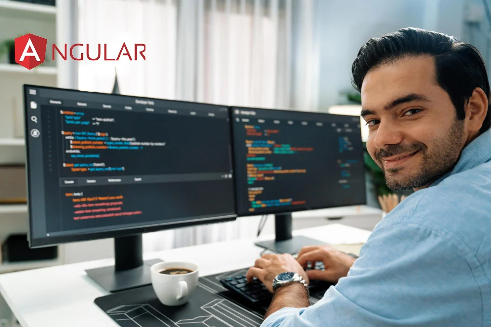 angular developer working on computer and looking back