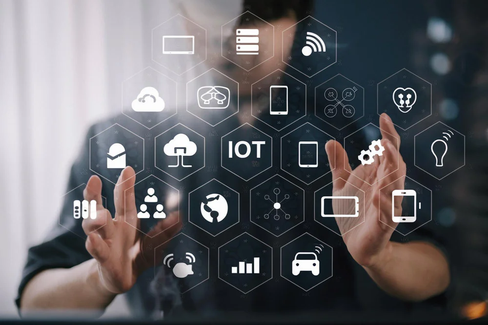 Person interacting with IoT icons